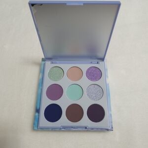 Morphe Eyeshadow Palette with Purple, Green, and Blue Shades